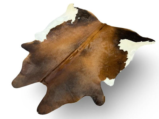 Tri color cowhide ,mix of dark brown white black legs and white under legs