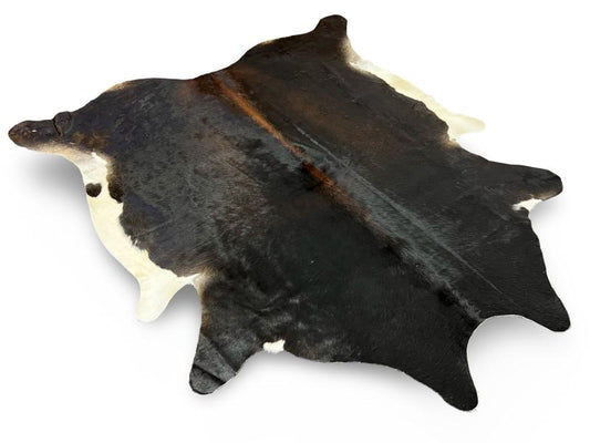 Tri color cowhide, black with brown centre and white ends