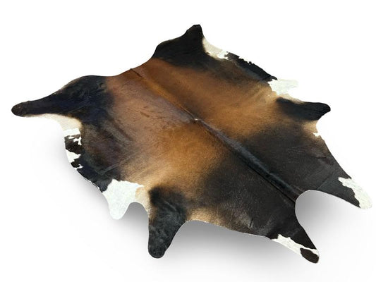 Tri color cowhide, black with brown centre and white ends
