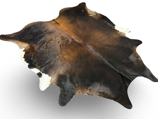 Tri color cowhide, black with dark brown centre and white ends