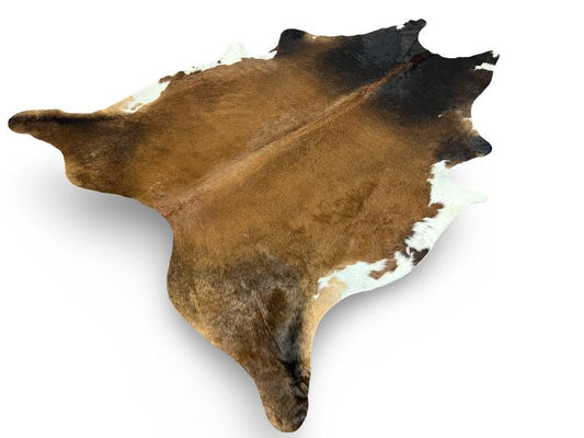 Tri color cowhide,light brown with black neck and white ends