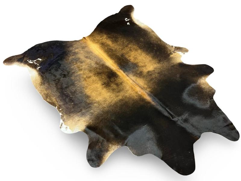 Tri color cowhide with black neck and back legs,Light brown centre and white spots on sides